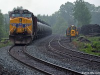 UP 5554 brings up the markers on 550's train as it rolls southbound along the passing siding and back track at Palgrave. UP 5549 and CP 8736 are on the head end. 1633hrs.