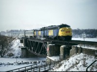 Environment Canada records show that the coldest temperature ever recorded at Toronto's Pearson airport was -31.3 °C on January 4, 1981.  It might have been a few ticks warmer here at Rouge Park along the Lakefront east of Toronto where 4 frozen railfans from Cleveland started the day instead of being home to watch the Browns lose their best shot at the Super Bowl on a play now famously known as Red-Right 88. We had spent the night in Toronto and it was a real surprise that the vinyl seats our Chevy Nova didn't crack. But it did fire up pretty strong.  The wind off the frozen lake here was brutal but we got a lot of good shots that weekend.