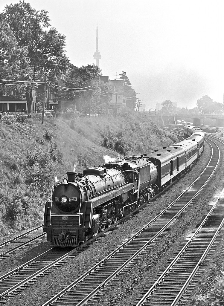 From the Dunn Avenue bridge, #6060 is shown racing towards Niagara Falls.

Dave Beach and I missed each other by a handful of years, a few feet, and about 100 degrees F.  Check out his great shot...

http://www.railpictures.ca/?attachment_id=19596