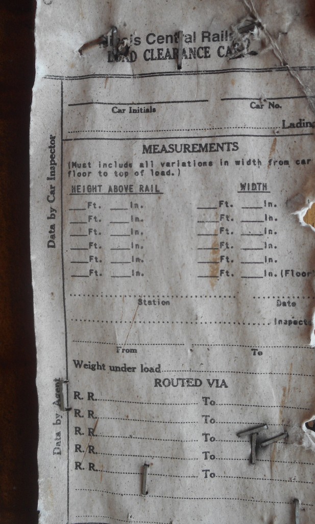 OSR had a unique load recently.  Two transformers for Hydro One, unloaded at the Arkell siding.  SW1200Rsu 1210 remained on site.  After the second transformer was unloaded from one of the flatcars, I looked at the load clearance card, seeing Illinois Central Railroad printed on it. The ICRR became part of the CNR in 1998, making this card date back to a move over twenty years ago. The card does not appear to be filled out for some reason. 

*The reporting mark of the flatcar may be a digit off. I am not certain about the final number being 1, but it may have been.