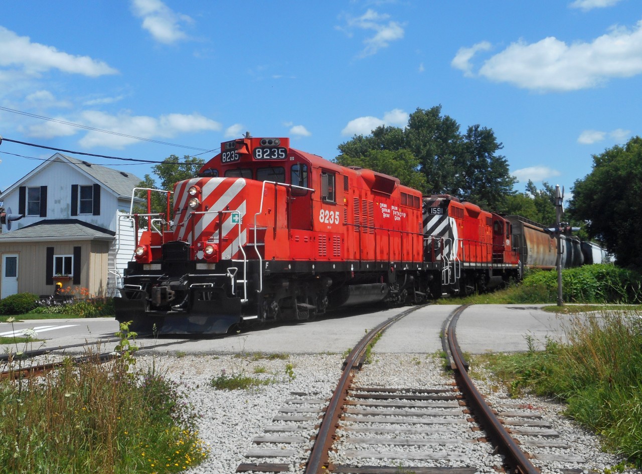 The OSR GP9s rumble across Morris Street in Guelph while switching PDI Elizabeth.