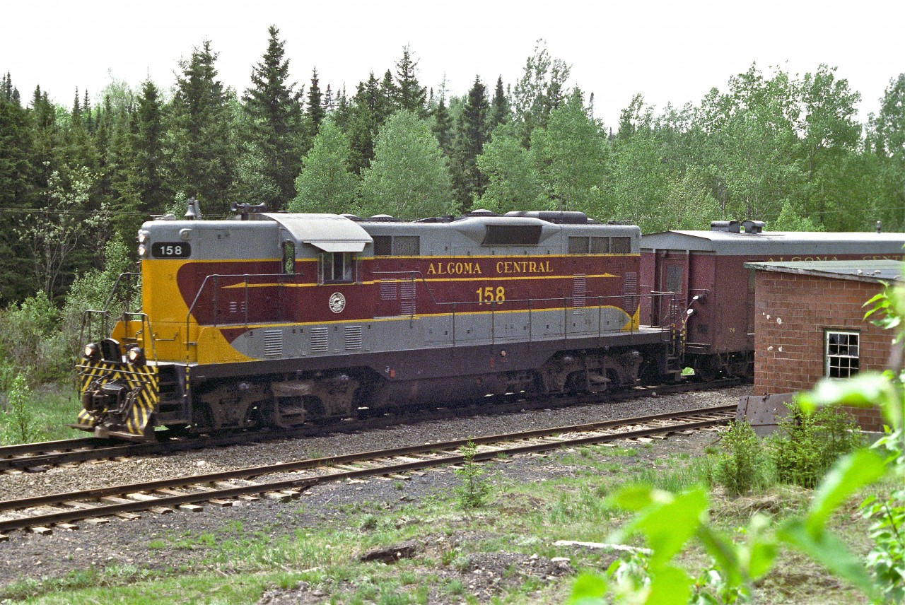 I was following with great interest the recent threatened demise of the Algoma Central Railway.  I'm delighted that it will continue to run.  It is on my bucket list to ride that train some autumn.


GP7, #158, is shown at Frater in June 1983. This locomotive was manufactured by GMD in 1951, and retired (scrapped) 53 years later.