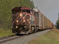 M301 with a pair of C40-8M cowls crests the grade west of Wildwood Alberta on a sweltering summer's day. The trackside detector temperature reading was 37C