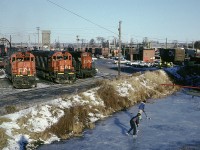 A lot has changed since I took this picture. Of course the MLWs are gone and try skating on CN property these days! The fuel tank is no longer there nor the containment pond and kids don't use tube skates any more!