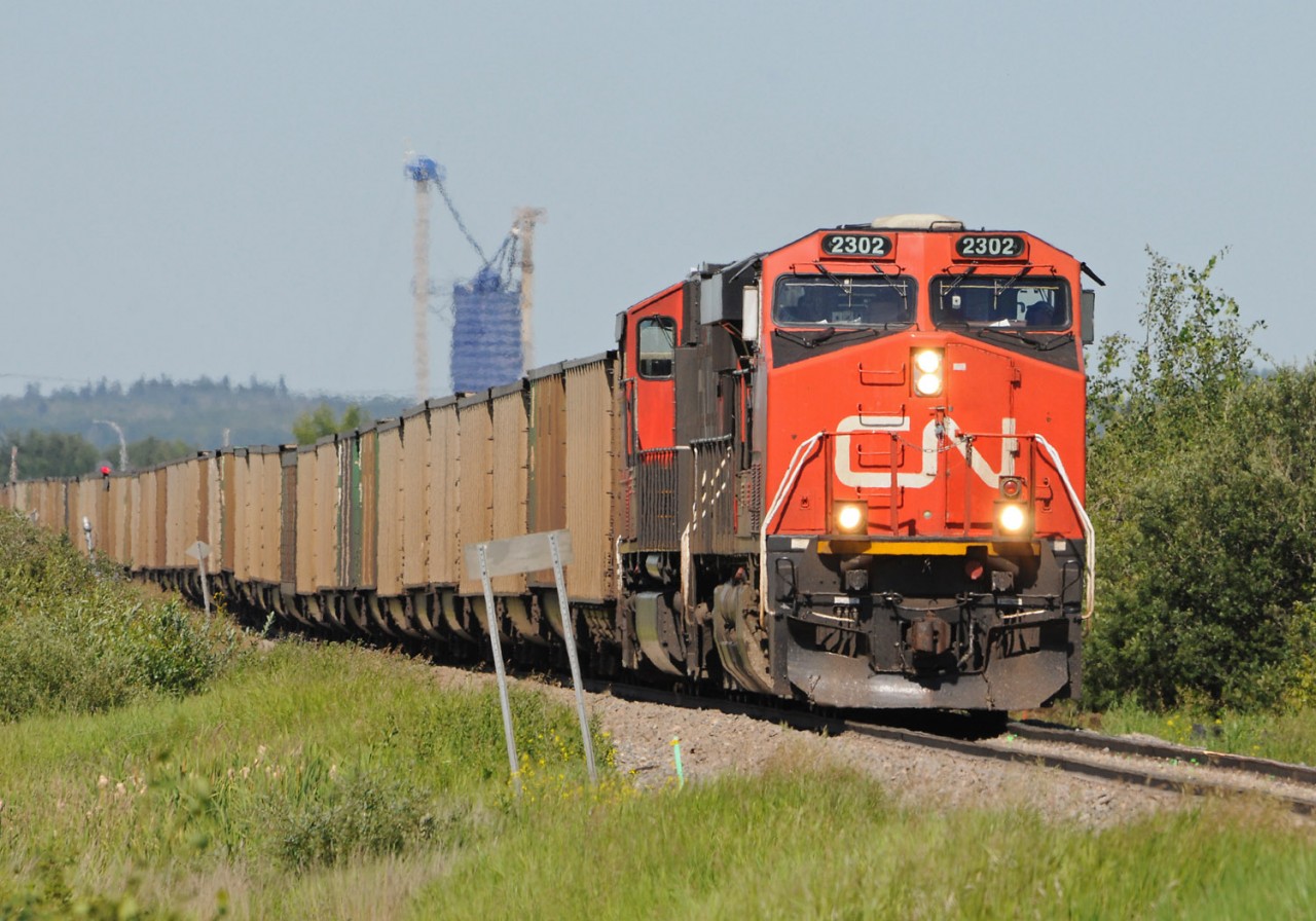 For a while in mid-2013, one could find unit coal trains like this one with mostly BN/BNSF cars on the CP Leduc Sub, pulled by CN and BNSF power. In this case, CN 2302 and 5616 are on the point, with 8890 as an end DPU. As of mid-2015, these trains no longer seem to run, and I haven't seen CN or BNSF power on the Leduc Sub. for quite a while, but other foreign power, especially UP, has remained fairly common.