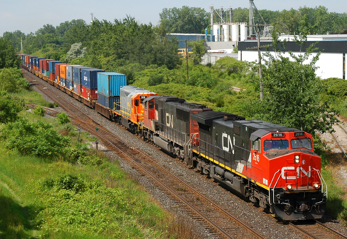 CN 2616 - CN 5627 - QNSL 312 leading CN Q14891 20 through Massey's with 94 cars