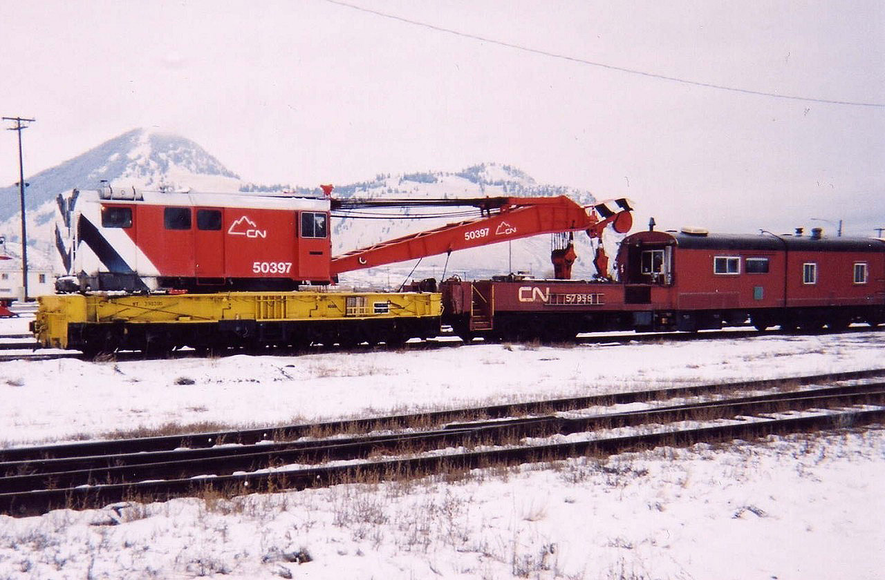 CN 50397 Industrial Brownhoist 250 ton wrecker, s/n 12368 built in 1957. It was originally assigned to the GTW in Battle Creek, MI. according to a July 1960 CN crane roster. It sits here in the cold snow covered Kamloops Yard in January of 2003 nearing the end of its useful life at CN.