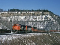 Train #725 was the steel train to Stelco's Lake Erie Works in Nanticoke, often powered as on this day by a pair of GP40-2Ws. It ran with a caboose on both ends to facilitate changing direction in Brantford. There doesn't appear to be any hikers out on the peak today!