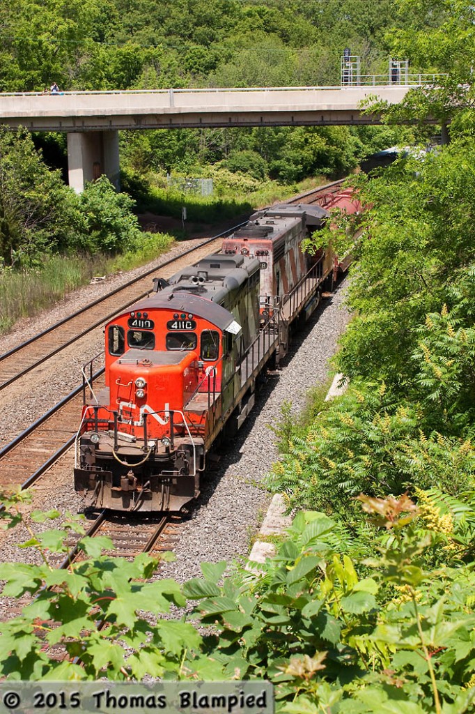 Amid groans of disappointment from the assembled photographers, CN 4110 heads train 551 down the grade towards the Stuart Street Yard. Despite the number of GP9s slowly decreasing, the lack of GMD-1 was too much for some to take. This was the first time that I took part in the annual Bayview Junction gathering and I had a great time. I highly recommend it for good conversation with people who just like trains.