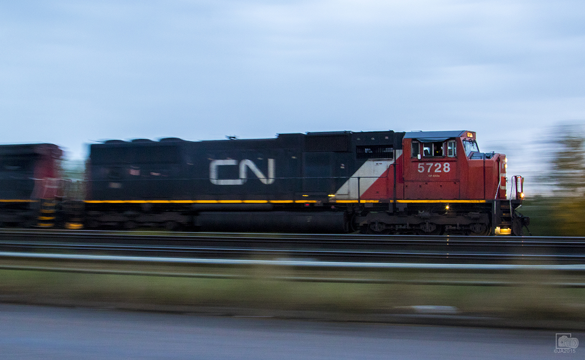 After making its lift in Bissel yard CN 5728 is on the move.