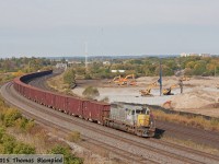 A ballast train rolls past the site of the future GO maintenance facility in Whitby. Three years later, the construction site looks just about the same!
