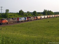 A short 516 passes Newtonville Road on it's way to Belleville in late afternoon light. Been a while since I caught a GTW geep out here, and with no GE's in sight, all the better. CN 8924, GTW 4909, CN 5478. 1909hrs.