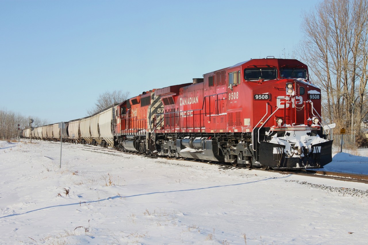 Once in the Canadian Pacific Dual Flags paint scheme, CP AC4400CW 9508 diverges off the Minnedosa sub, and onto the Carberry sub mainline in Portage La Prairie, Manitoba along with some help from CP SD40-2 5763.