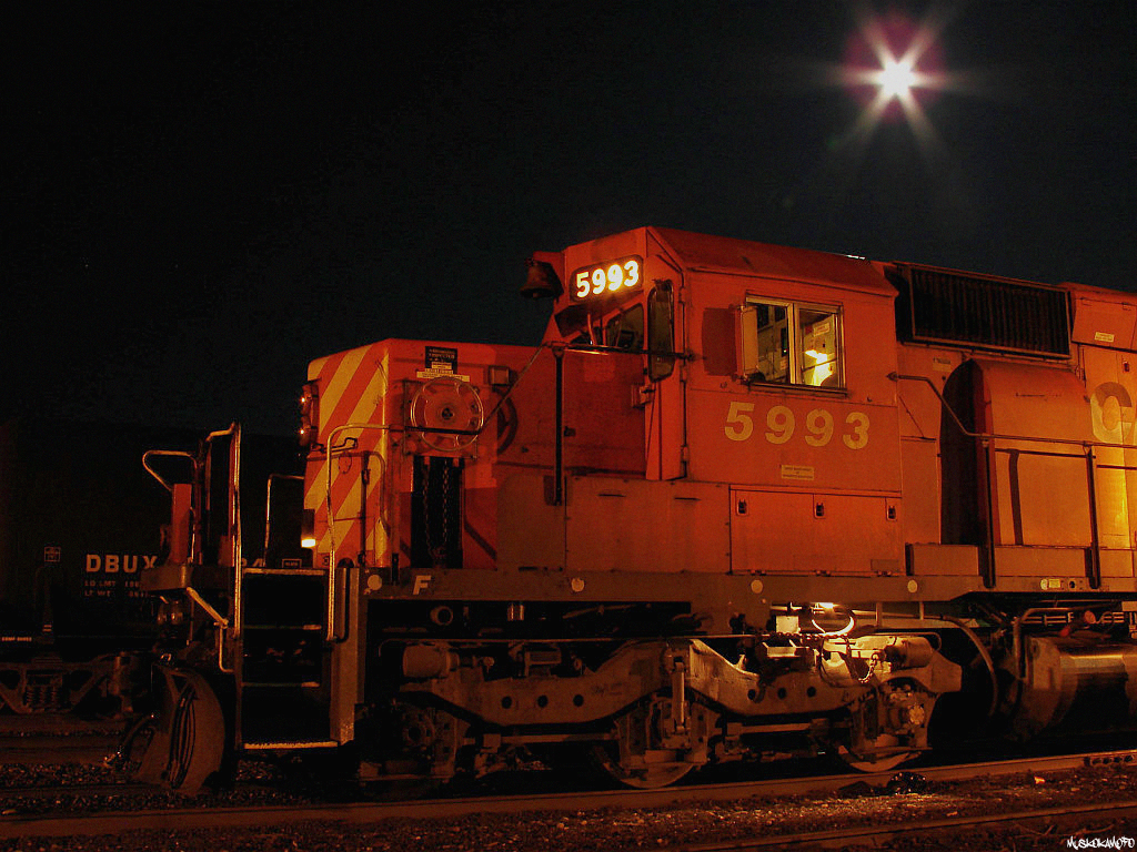 CP 5993 North idles under a full moon in track 2 at MacTier standing by for a fresh crew to carry onto Cartier.