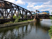 VIA 919 pushes a deadhead movement towards Montreal's Central Station.