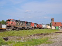 CN 435 pulls into Brantford with their dynamic brakes howling as they slow to stop for their work in the yard.  The power for 435 on this day was CN 2418, CN 2160, CN 5330.