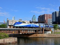 AMT 1350 is passing the abandoned Wellington tower as it pushes AMT 809 towards Central Station. 