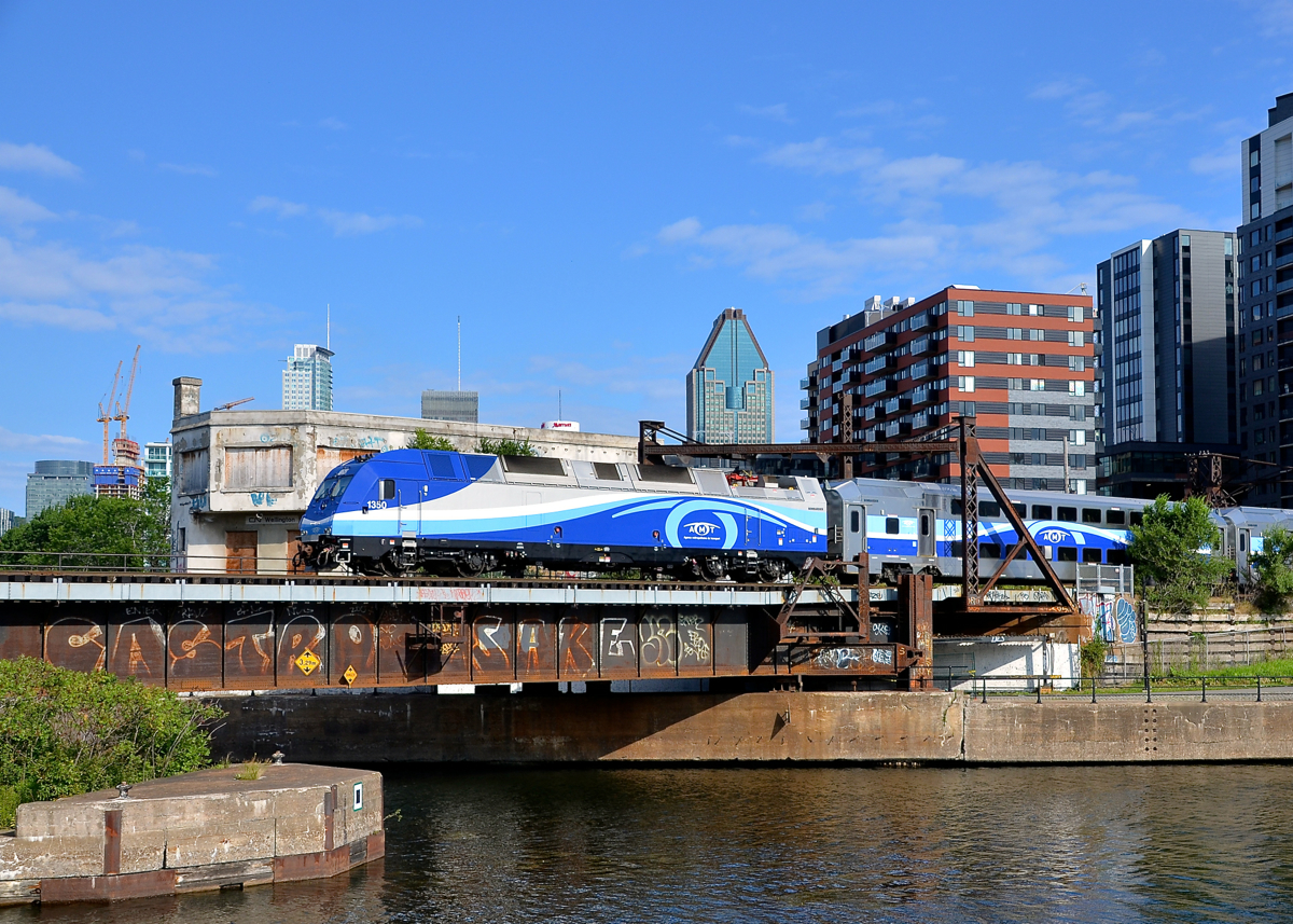 AMT 1350 is passing the abandoned Wellington tower as it pushes AMT 809 towards Central Station.