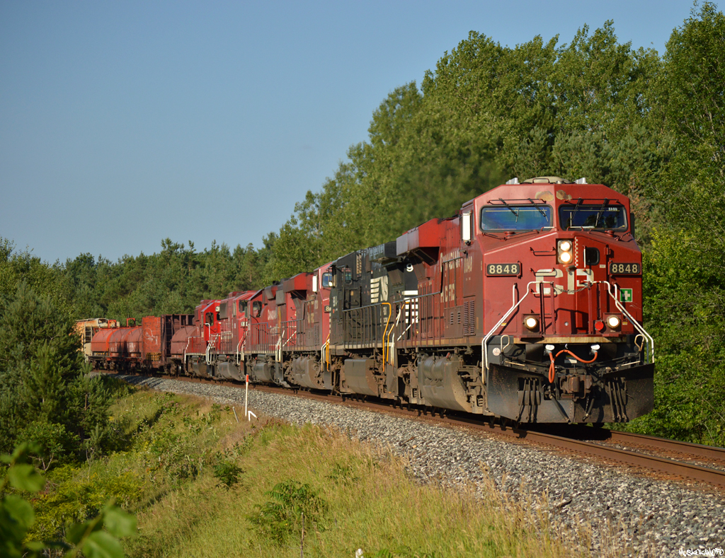 CP 420-08 flies through the curve out of Midhurst with quite the consist, in the form of CP 8848/NS 9814/CP 8723/CP 5792/SOO 6061/CP 3085. I'd consider SOO 6061 to be the most notable here (being the last unrebuilt SOO SD60M), but between the foreign power and old EMD classics it's hard to pick favorites!