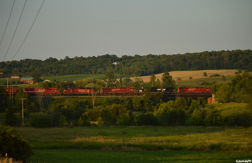 CP 8848 South is finally done their work at Spence, and is seen cruising through Tottenham overtop of the South Simcoe Railway moments before the sun bows below the treeline. Anybody know a good arborist?!