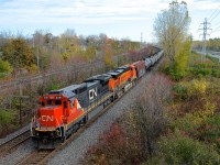 CN 711 heads west through Beaconsfield with CN 2131 & BNSF 5870. 