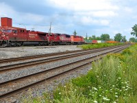 <b>Some EMD standard cabs trailing.</b> CP 143 has ES44AC CP 8747 leading two older standard cabs (SD60 SOO 6053 & SD40-2 CP 5957) as it leaves Dorval now that the conductor is on board. The last two units arrived in Montreal early in the morning on CP 132, the eastbound Expressway.