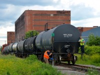 CP 2250 is about to shove 7 empties from Fleischmann's Yeast off the Lasalle Loop and towards the Adirondacks sub, as soon as the conductor sets the switch for the Loop.
