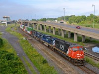 CN 120 hast two SD75I's sandwiching two BC Rail Dash9's (CN 5654, BCOL 4650, BCOL 4645 & CN 5708) as he passes Turcot West.