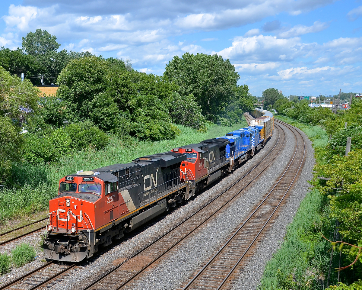 Bluebirds in transit. CN 401 has a pair of CEFX AC4400CW's in transit (CEFX 1016 & CEFX 1011) as it heads west through Montreal West. They are leaving the Arnaud Railway, with 1016 bound for the Providence & Worcester and 1011 heading to Canadian Allied Diesel. Ahead are two more GE products (CN 2257 & ex-ATSF CN 2199).