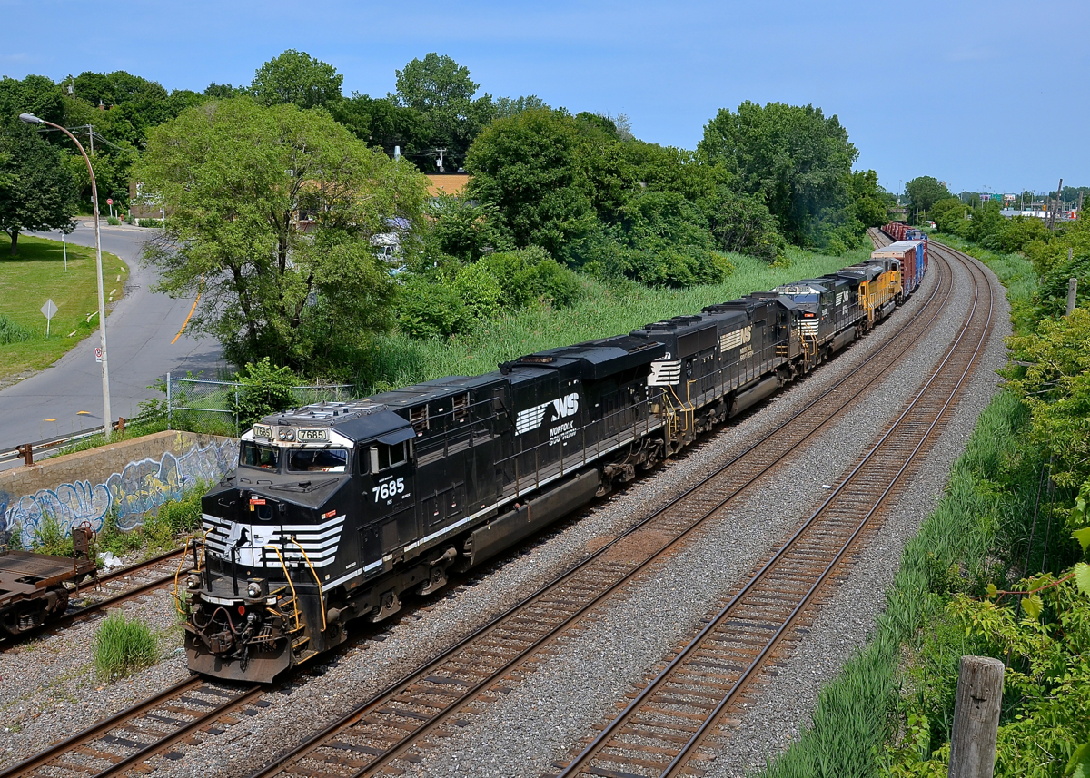 CN 529 has four NS units, including an ex-UP SD9043MAC as it passes through Montreal West. Power is NS 7685, NS 2567, NS 9885 & NS 7303.