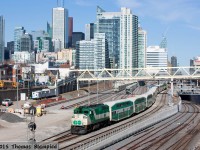 With the introduction of the new MP40 locomotives, GO's fleet of F59s has dwindled. However, the remaining F59s can often be seen as part of L10L consists on longer runs. Here, 558 is seen leading a westbound (probably heading for Barrie) rush-hour train towards Bathurst Street. 