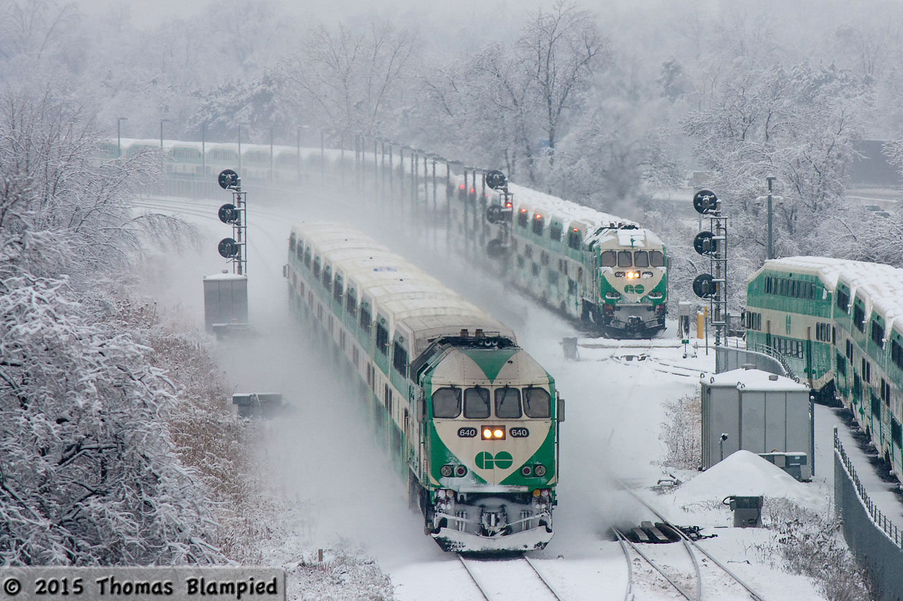 Boxing Day sees a fresh layer of wet snow blanket everything as 640 slows for a stop at Whitby. In the background, another trainset prepares to depart Henry to join the Lakeshore East services for the day.