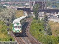 GO 655 approaches Pickering with an Oshawa-bound Lakeshore East train after passing under the iconic CN bridge over Highway 401.
