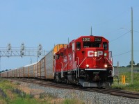 CP 2262 and 2254 switching at the east end of the yard where they hold up traffic at the crossing before running round the train and heading west to Pender.