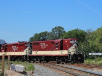 OSR 378 and 1620 take a train of loaded Autoracks over the Dundas main at CN Carew and up to the CP yard.