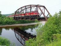 The Agawa Canyon tour train crosses a river along route 532 on its way to Agawa Canyon.