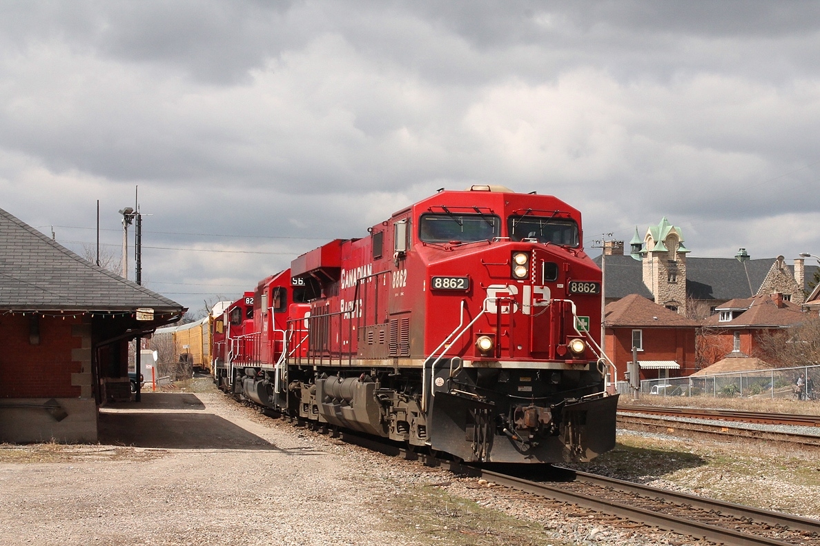 The reason I have used an older picture of an eastbound autorack is to relate the following cautionary tale. On Saturday 18th July I had returned from collecting my daughters from shopping and went to eat a sandwich by Galt Station, as I had done countless times before. A local police car passed by just as I had finished eating my sandwich. I decide as nothing was coming to move off to Brantford and drove down into Galt town centre where I was followed by the police car and "Lit up". He politely asked for licence and insurance and ran checks, whilst my car held up traffic. He told me the reason why he had stopped me was because he had observed me in a well-known "drug area". I was allowed to continue with no further problems but be warned! It provided my wife, who was not with us, with a great deal of amusement. I am sure she would have got me arrested!!