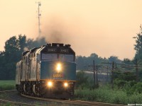 Transcontinental passenger train 'The Canadian', classified as VIA 02, charges past the Ramara Rd grade crossing with 2 rebuilt F40PH-3's as the power, running just over 12 hours late into Toronto from Vancouver. 

The train had called the signal on the approach the Brechin as 'VIA number 2 clear to stop advance Brechin'. While the signal at the SSS Brechin displayed solid red, the train charged right past it doing nearly 60mp/h with no authority from RTC that I had heard of. Any explanation would be appreciated. 
