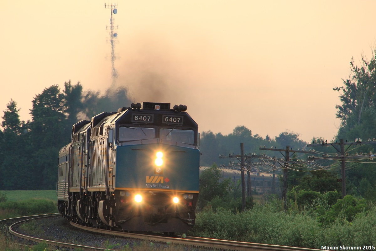 Transcontinental passenger train 'The Canadian', classified as VIA 02, charges past the Ramara Rd grade crossing with 2 rebuilt F40PH-3's as the power, running just over 12 hours late into Toronto from Vancouver. 

The train had called the signal on the approach the Brechin as 'VIA number 2 clear to stop advance Brechin'. While the signal at the SSS Brechin displayed solid red, the train charged right past it doing nearly 60mp/h with no authority from RTC that I had heard of. Any explanation would be appreciated.
