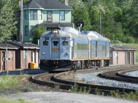 VIA Rail's train 185, a.k.a. the "Lake Superior", a.k.a. the Northern Ontario Budd cars, slows to its final station stop at White River, ON.