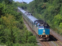 2 rebuilt F40PH-3 locomotive's are in the lead of trans-continental VIA #1, also known as 'The Canadian', which crosses Canada from Toronto en-route to Vancouver. This shot is usually very rare to come across as #1 usually departs Toronto (about 45 minutes away for #1) at 22:00, making it pass through this location on the York Subdivision at nearly 23:00. However, since the last days inbound VIA 02 got in so late (past 22:00 for those wondering), #01 had to be rescheduled for a 08:30 departure out of Toronto the next morning.

Here they are doing 45mp/h on the York Sub hurrying to make up at least some of their delayed time into Vancouver.