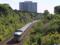 A park car brings up the rear of trans-continental VIA #1, also known as 'The Canadian', which crosses Canada from Toronto en-route to Vancouver. This shot is usually very rare to come across as #1 usually departs Toronto (about 45 minutes away for #1) at 22:00, making it pass through this location on the York Subdivision at nearly 23:00. However, since the last days inbound VIA 02 got in so late (past 22:00 for those wondering), #01 had to be rescheduled for a 08:30 departure out of Toronto the next morning.