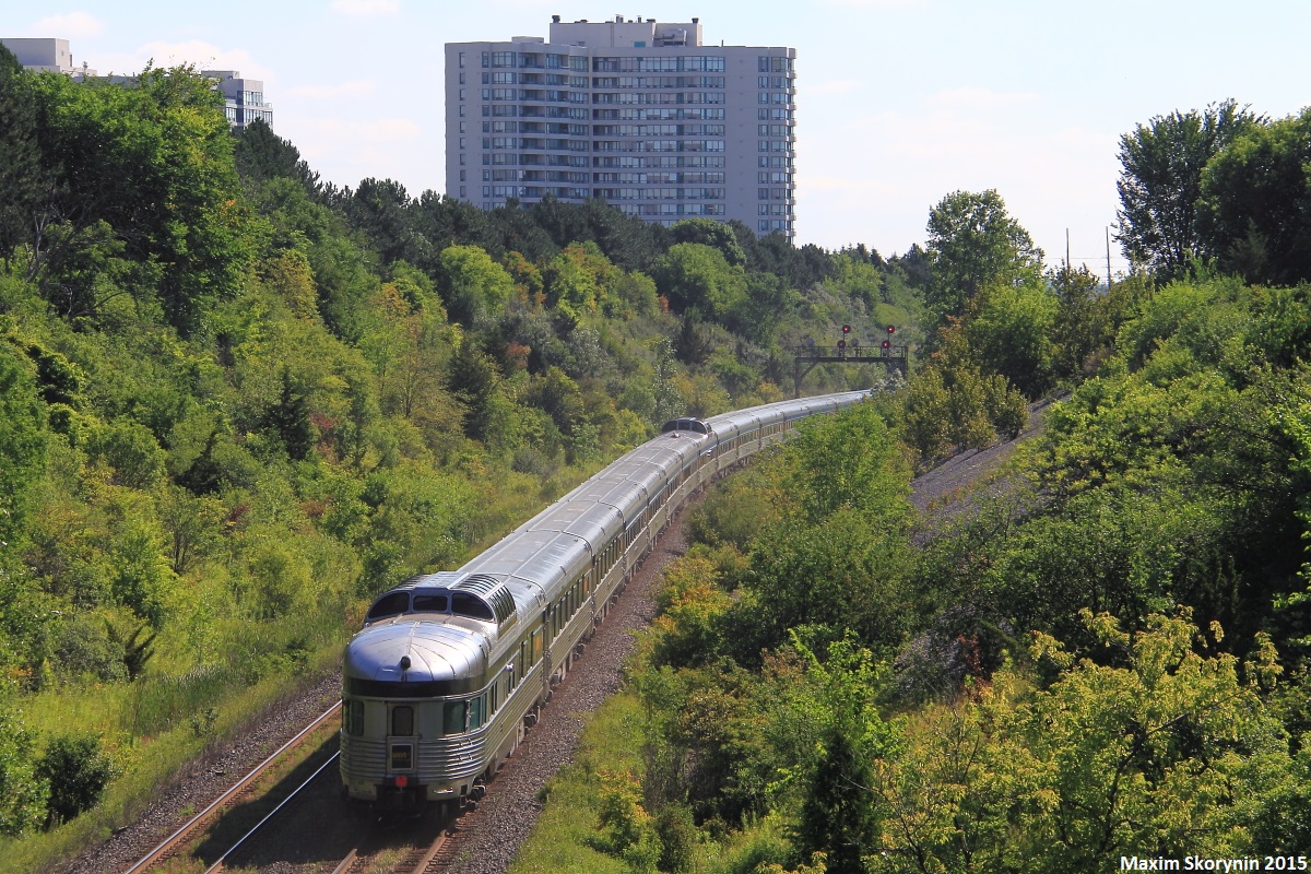 A park car brings up the rear of trans-continental VIA #1, also known as 'The Canadian', which crosses Canada from Toronto en-route to Vancouver. This shot is usually very rare to come across as #1 usually departs Toronto (about 45 minutes away for #1) at 22:00, making it pass through this location on the York Subdivision at nearly 23:00. However, since the last days inbound VIA 02 got in so late (past 22:00 for those wondering), #01 had to be rescheduled for a 08:30 departure out of Toronto the next morning.
