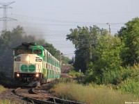 Northbound GO Train #811, the 2nd last evening downtown Toronto - Barrie commuter train approaches Rivermede Road at mile 14 of the CN Newmarket Subdivision with a rare L10L consist - a F59PH locomotive on the head end with a MP40PH-3C on the tail. The leading F59PH is one of the only 4 or 5 left on GO's fleet, and having 2 different engines on one GO train is hard to come across in 2015. The Newmarket Subdivision used to be owned by the Canadian National Railway Company, and later, GO Transit had purchased the line. However, it is still operated by CN. GO Transit also started construction of a 2nd track all the way to Barrie to run hourly service in the future, which is planned to be completed by 2020.