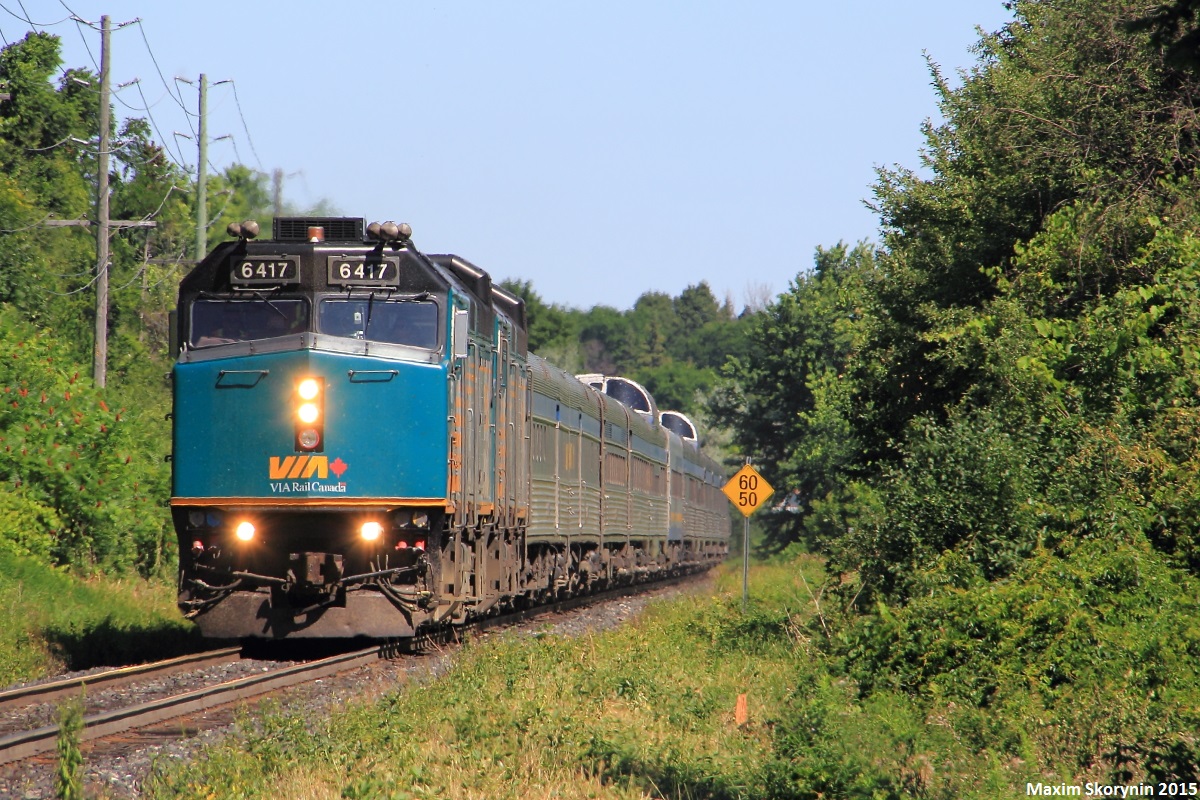 Transcontinental passenger VIA #2, also referred to as 'The Canadian', which crosses Canada from Vancouver to Toronto, is seen here heading southbound past the Old Cummer GO Station at mile 14 of CN's Bala Subdivision. 2 rebuilt F40PH-3's are handling the train with a special 'Glen Fraser' car about mid-train. In total, the train was exactly 100 axles long and arrived into Toronto just under 3 hours late, which is pretty impressive for this service.