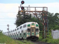 Cabcar #254 charges GO Transit commuter train 803 northbound past the old signal bridge at CN Snider South. GO 803 is the 2nd of the daily 7 northbound evening GO Trains from downtown Toronto to Barrie, on GO Transit's Barrie Line. With vador replacements looming nearby, I had to get this shot, and while I was hoping for an F59PH leading, this will do just fine.