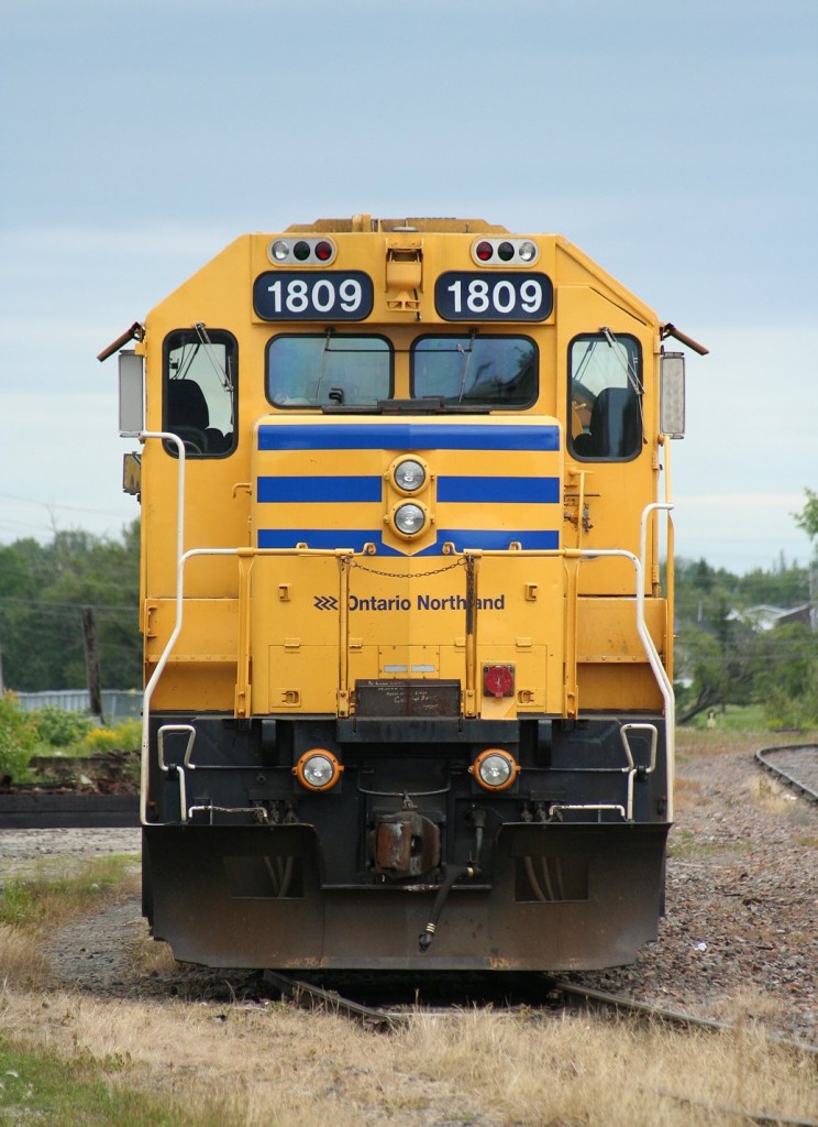 Power from Ontario Northland's recently arrived train no. 516 from Hearst idles in the siding at Kapuskasing waiting for train no. 313 to arrive from Cochrane.