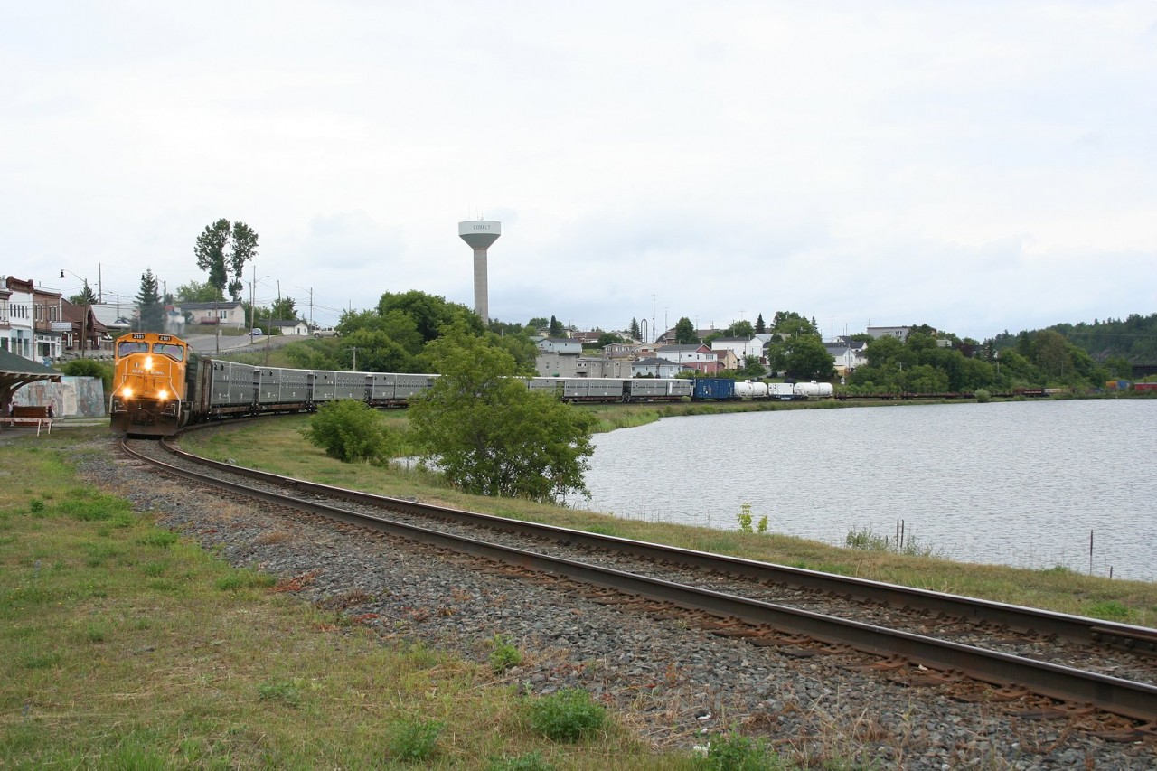 Work ONT 2101 blasts through the curve at Cobalt, bound for Temagami siding where the work train will be based for a few weeks.