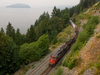 A visit up to Horseshoe Bay along BCs Howe Sound finds CN 546, the daily switcher from North Vancouver to Squamish, heading south back to North Vancouver. Recent forest fires have produced quite a bit of smoke in the last few days, causing scenery, normally visible to be blanketed. 