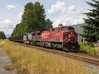 A movie star is caught leading an eastbound sulphur train through Albion, BC. CP 9777 was used in the movie Unstoppable and is seen with patched ex-SP AC4400CW 6419. 